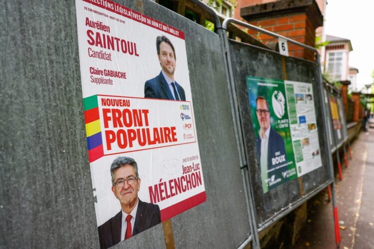 Αφίσες υποψηφίων για τις βουλευτικές εκλογές στη Γαλλία (φωτ.: EPA/Mohammed Badra)